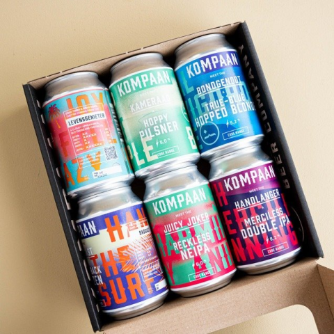6 blikjes kompaan bier in een bierpakketje